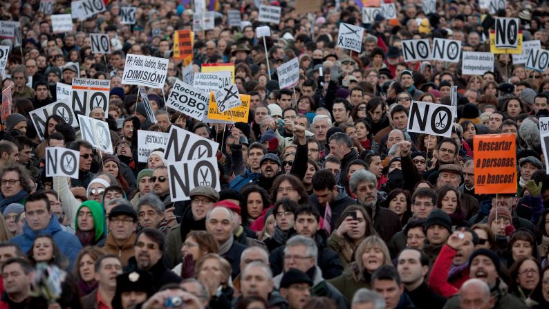 Demonstrators shout slogans at Neptuno Square during a march made by thousands of people on Saturday, February 23 in Madrid.