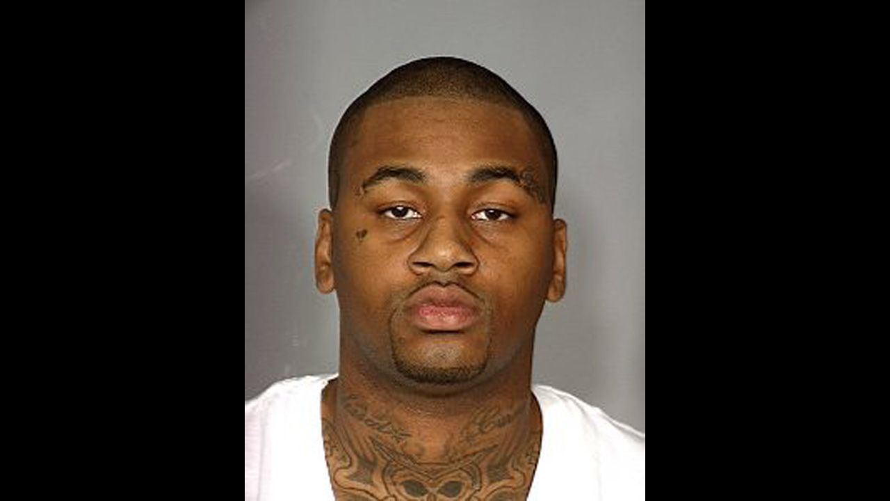 Ammar Harris is wanted for questioning in a shooting and fiery crash that left three people dead.