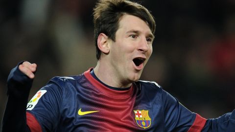 Barcelona forward Lionel Messi celebrates after scoring the winner at home to Sevilla on Saturday.