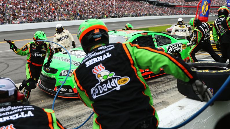 No. 10 Danica Patrick pits during the Daytona 500. She made history when she became the first woman to <a >secure the pole position</a> for the race.