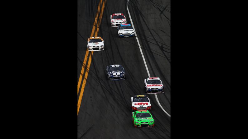 Danica Patrick leads the field during the Daytona 500. She became the first woman to lead a lap in the race.