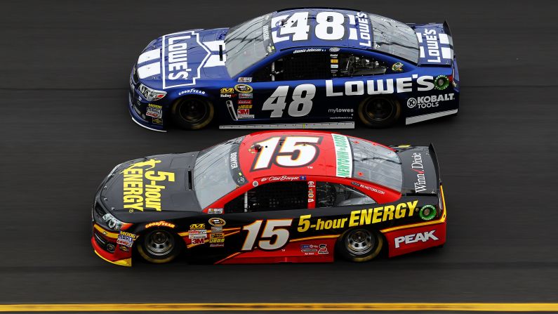 No. 48 Jimmie Johnson races neck and neck with No. 15 Clint Bowyer.