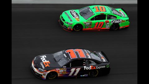 No. 11 Denny Hamlin leads Danica Patrick on Sunday. Patrick, who started out the race in front, entered the final lap in third place but got boxed in and ended up in eighth place.