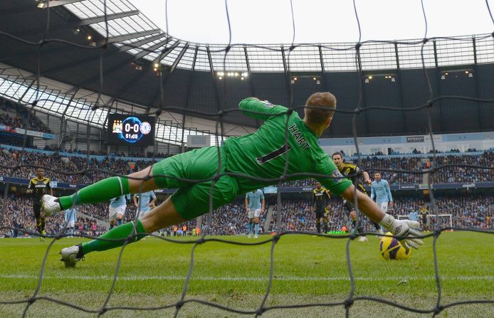 Joe Hart stretches to save Frank Lampard's second half penalty for Chelsea at the Etihad Stadium. 