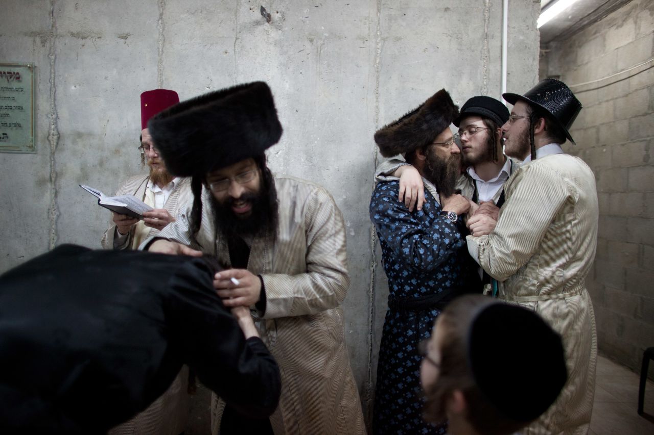 Ultra-Orthodox Jews from the Lelov Hasidic sect, celebrate in Beit Shemesh, Israel. Purim commemorates the deliverance of the Jewish people from a plot to exterminate them in the ancient Persian empire 2,500 years ago.