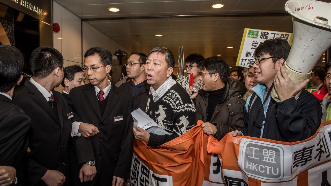 Activists demonstrate against the bid to punish striking drivers at the Singaporean consulate in Hong Kong on December 5, 2012.