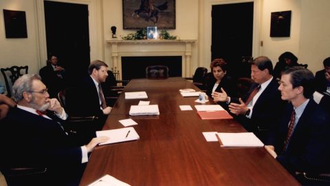 Koop and Vice President Al Gore, second from right, meet with administration officials to discuss a federal government settlement with the tobacco industry on July 9, 1997. The settlement was meant to recover part of the health care costs of smoking.