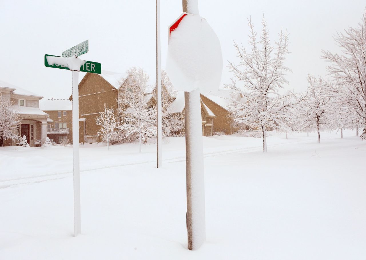 Heavy snow covers street signs in Kansas City, Missouri, on February 26.