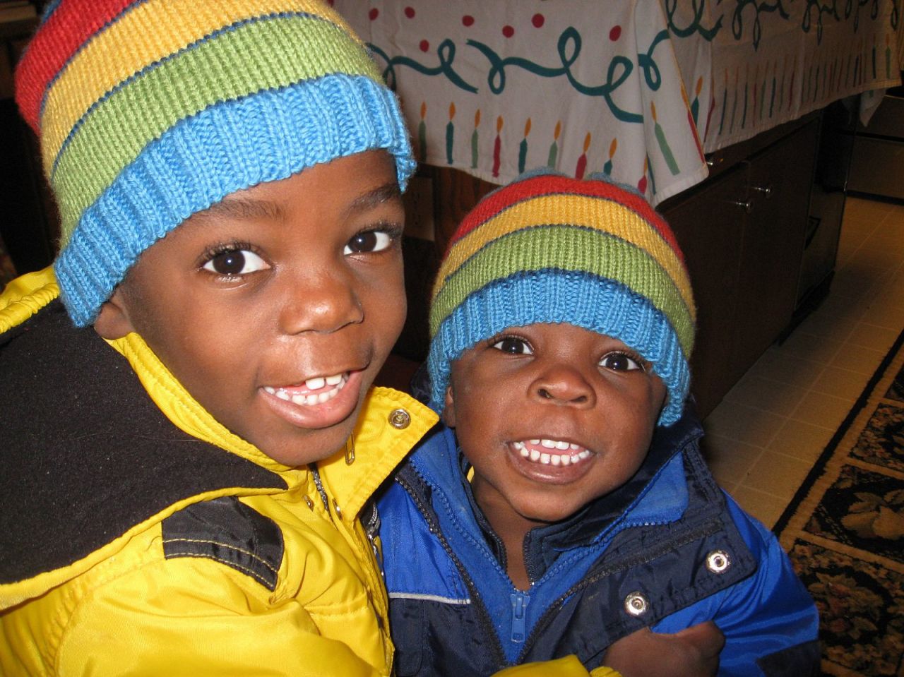 Brothers Zach, right and Philip were born in poverty in Uganda but are now living with their adopted family in the U.S.
