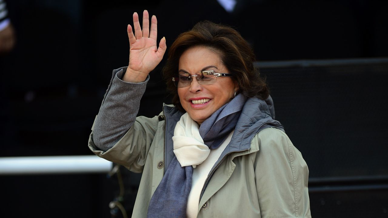 (FILE) Mexican leader of the National Education Workers' Union, Elba Esther Gordillo, waves during the ceremony of the National Police Day in Mexico City, on June 2, 2012. Gordillo was arrested on February 26, 2013 at the airport of Toluca, Mexico, for embezzling money from the teachers Union. AFP PHOTO/Alfredo Estrella        (Photo credit should read ALFREDO ESTRELLA/AFP/Getty Images)