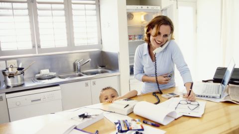 While telecommuiting can be a boon to working parents, that doesn't mean it's best for productivity, experts say.