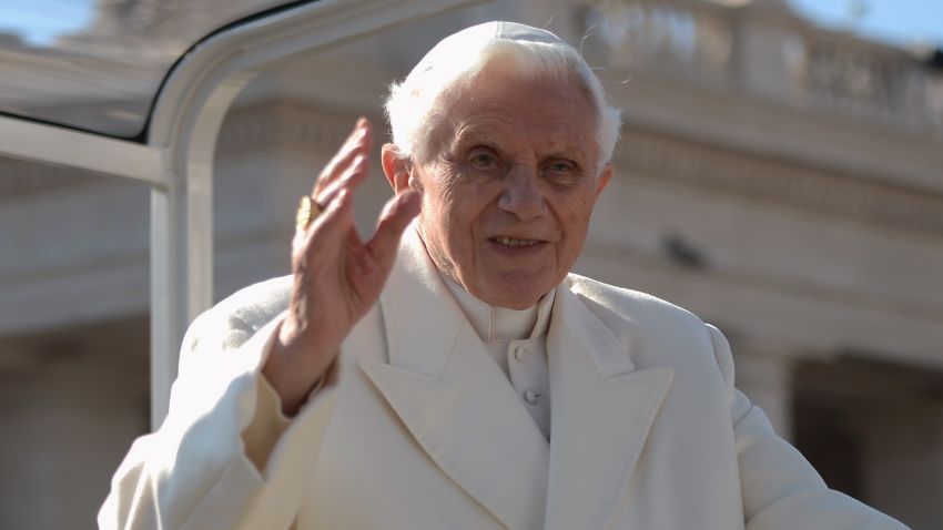 Pope Benedict XVI waves as he arrives on St Peter's square for his last weekly audience on February 27, 2013 at the Vatican.