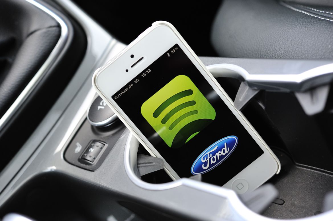 Ford has teamed up with Spotify to bring the music-streaming service to its Ford Sync AppLink cars in Europe. It's Ford SYNC AppLink allows drivers to control smartphone apps from the driver's seat, using voice control. 
