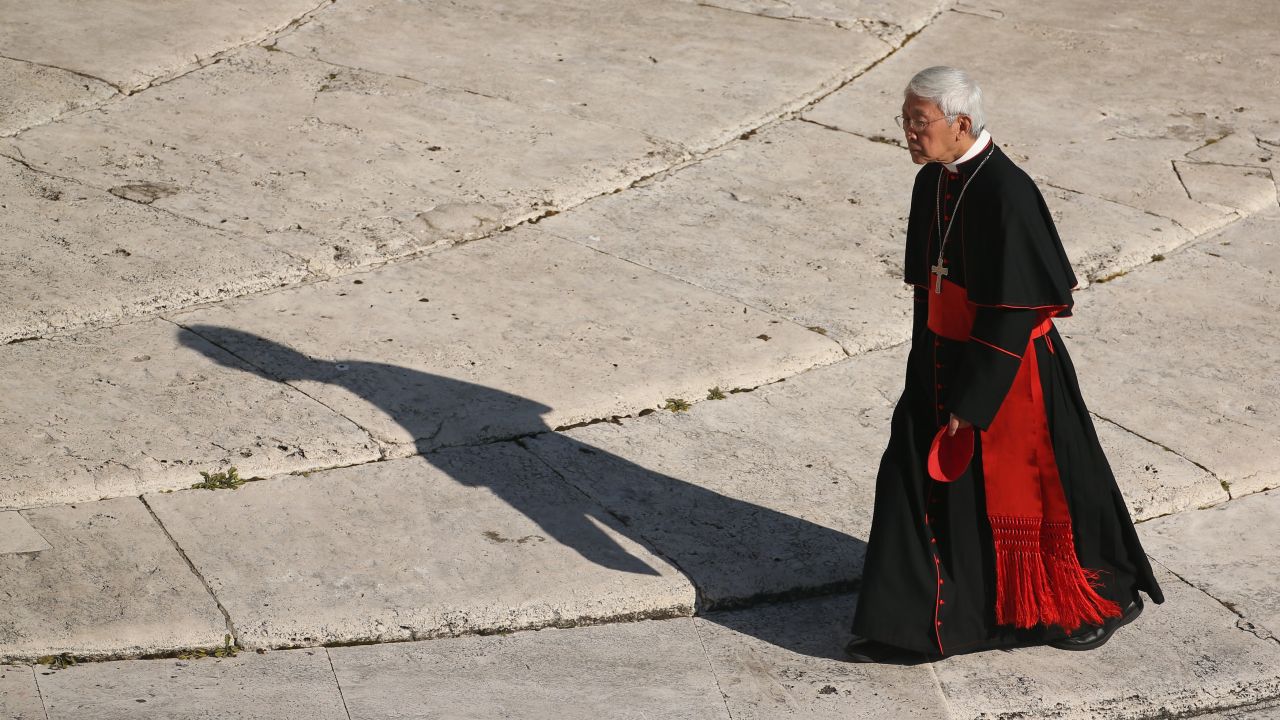 A cardinal arrives in St. Peter's Square. Benedict will leave office at 8 p.m. local time Thursday.