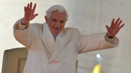 Pope Benedict XVI blesses the faithful before leaving the altar at the end of his last weekly audience on February 27, 2013 at St Peter's Square.
