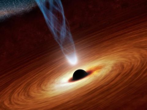 Esta es la representación de un artista del agujero negro supermasivo 12.000 millones de veces más grande que el sol.