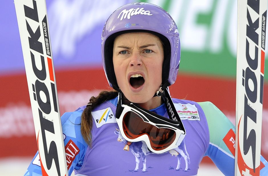 Before her victory, Maze looks on in horror as rival Lindsey Vonn suffers a serious accident on the opening day of competition in Austria. 