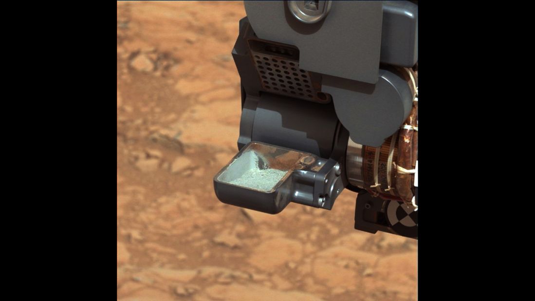 Curiosity shows the first sample of powdered rock extracted by the rover's drill. The image was taken by Curiosity's mast camera on February 20, 2013.