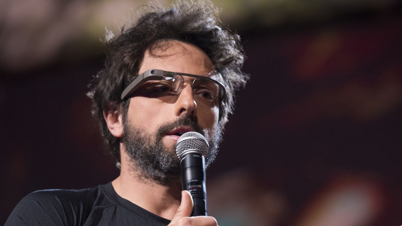 Google co-founder Sergey Brin wears his company's Google Glass headset while speaking Wednesday at TED.