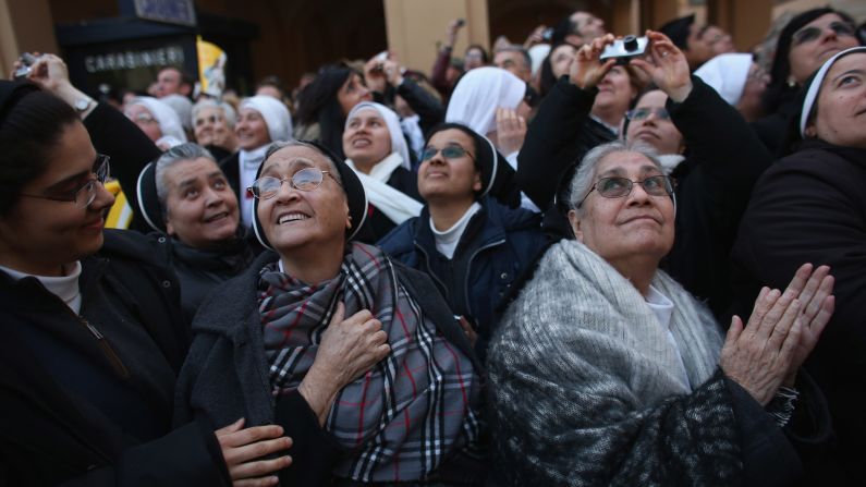 Nuns wait for Pope Benedict XVI in Castel Gandolfo, Italy.