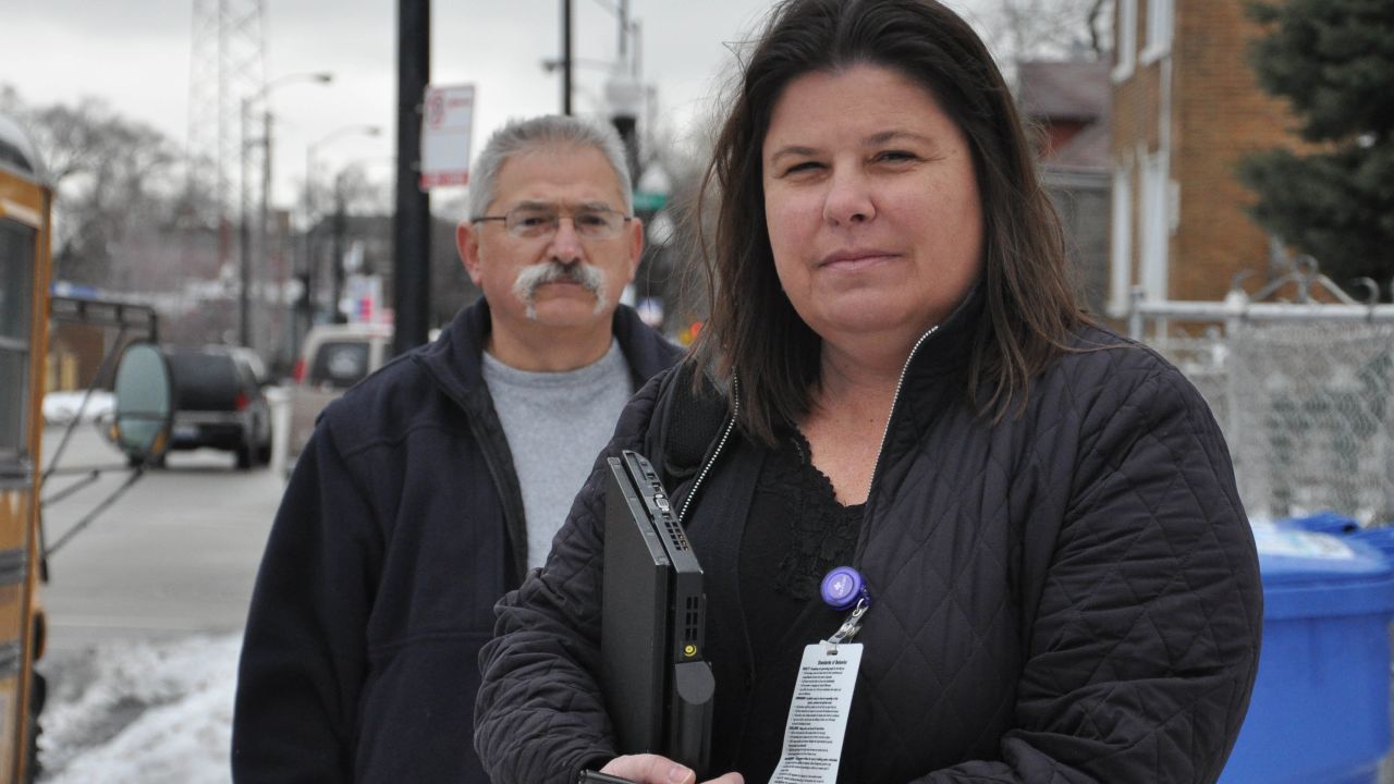 Beth Kairis visits patients in Chicago with retired police officer Steve Haras.