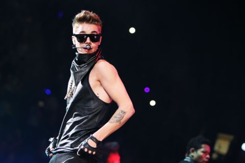 The start of the new year hasn't been any better --<a href="http://www.cnn.com/2013/01/02/showbiz/california-bieber-paparazo-death"> a paparazzo dies in oncoming traffic after attempting to take a photo </a>of the singer's car. A week later, photos hit the Web <a href="http://marquee.blogs.cnn.com/2013/01/07/bieber-trying-to-be-better-as-questionable-photos-emerge/">alleging marijuana use by Bieber</a>. The singer kept his sense of humor through the ordeal, <a href="http://marquee.blogs.cnn.com/2013/02/11/justin-bieber-hosts-snl-whats-the-verdict/">joking about it in his first stint as host of "Saturday Night Live." </a>Here he performs in Washington in December.
