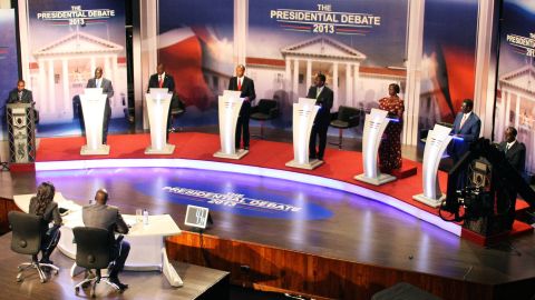 Kenya's eight presidential candidates are pictured during the first ever officially televised election debate in Nairobi on February 11, 2013.