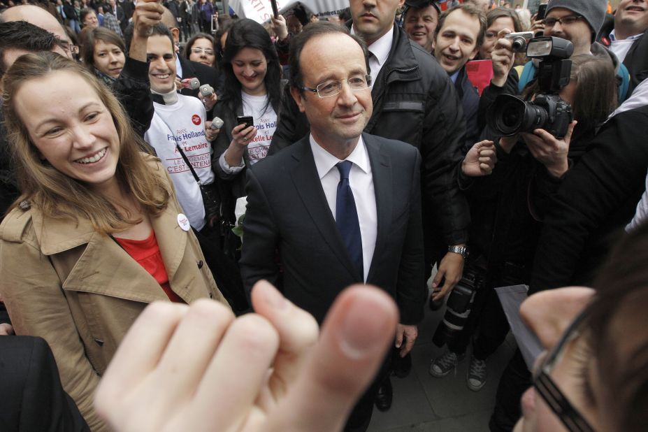 French President Francois Hollande (center) failed in his initial plan to raise tax to 75% but has not given up. Meanwhile, Axelle Lemaire (left), MP for Northern Europe, insists tax is not a factor behind the influx of French players to the English Premier League.