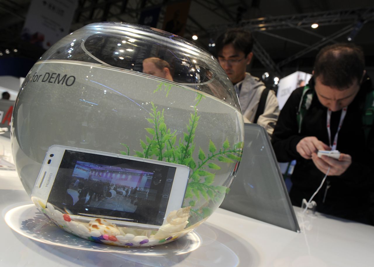Chinese manufacturer Huawei dunks its Ascend D2 in a bowl of clear liquid at the 2013 Mobile World Congress in February.