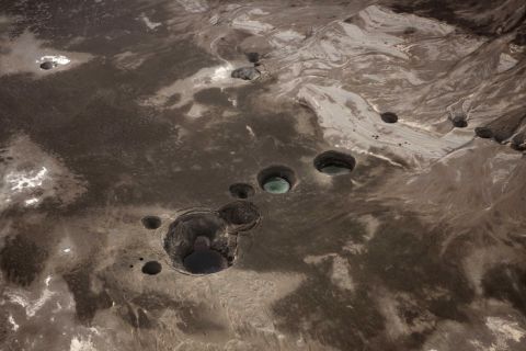 An aerial photo shows sinkholes created by the drying of the Dead Sea near Israel in 2011. 