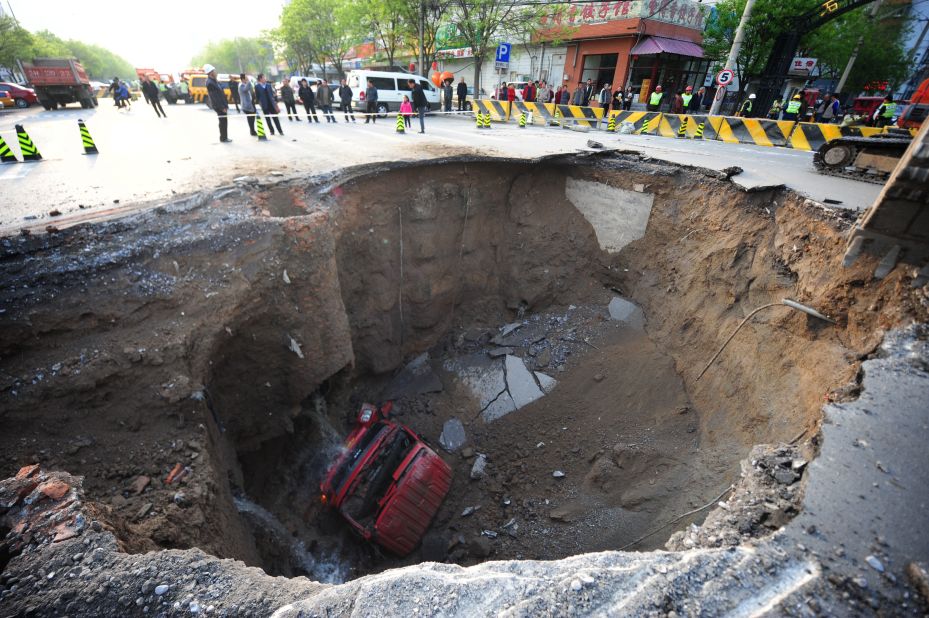 Construction on a subway line caused a huge sinkhole to form in a road in Beijing in April 2011.