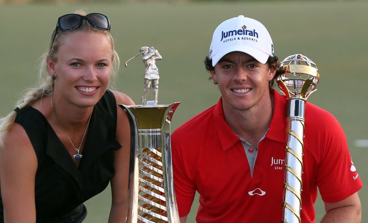 McIlroy and his girlfriend Caroline Wozniacki celebrate his winning the European Tour title with victory in the final event of the 2012 season in Dubai. 