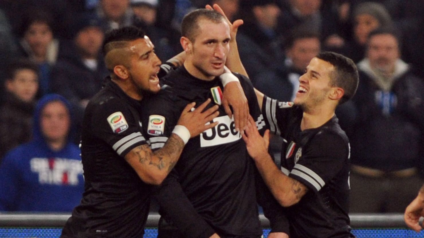 Giorgio Chiellini is congratulated by teammates after putting Juventus into the lead at Napoli.