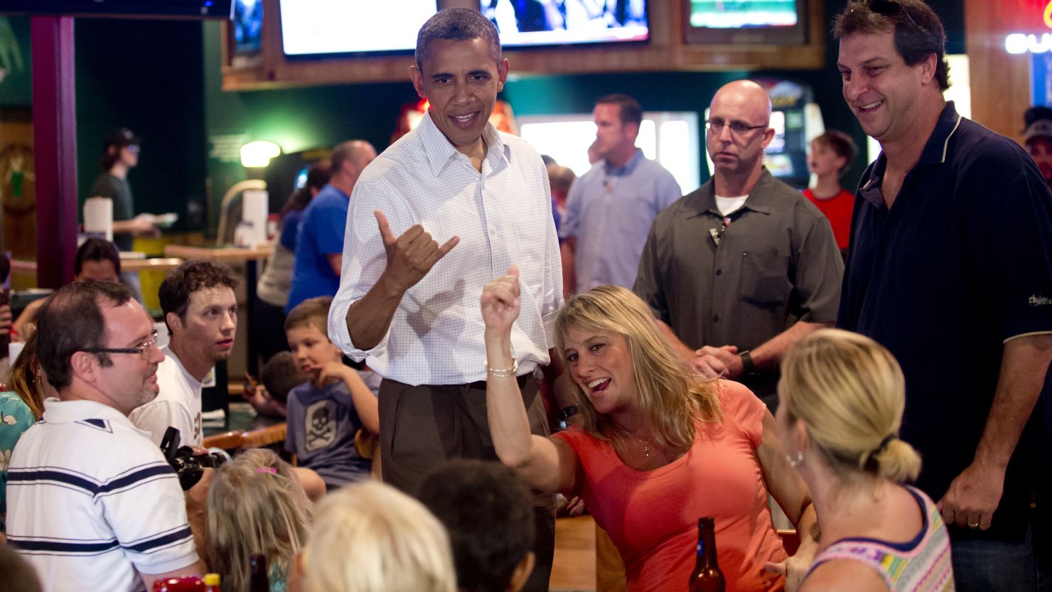 President Barack Obama, a native of Hawai, makes the Hawaiian symbol known as the "shaka" during a visit to a restaurant. While informal signs such as this are commonly seen, a genuine Hawaii Sign Language has been documented by researchers in Manoa.