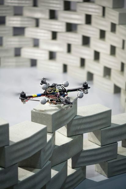 ETH Zurich have also put the quadrocopters to work building a six-meter model tower made by stacking blocks one on top of another.  