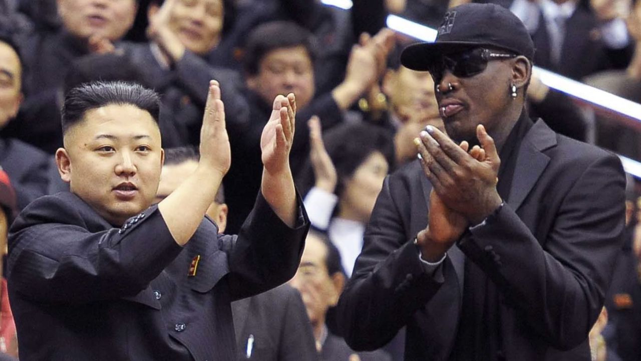 Former NBA star Dennis Rodman watches a basketball game with Kim Jong Un and his wife, Ri Sol Ju in Pyongyang, North Korea in February.