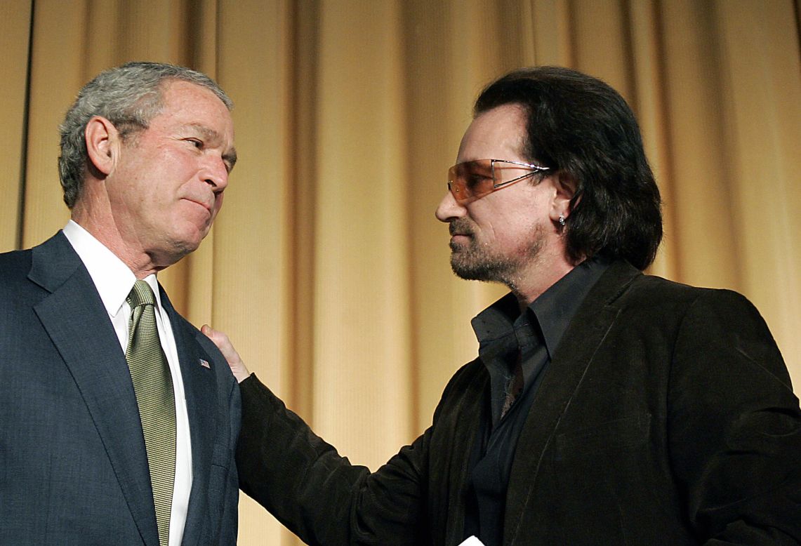 U2 frontman Bono, who was named the most politically effective celebrity of all time by the National Journal, has campaigned for third-world debt relief since 1999. In March 2002, he appeared next to President Bush for the unveiling of a $5 billion aid package for the world's poorest countries. Here, the two attend the National Prayer Breakfast in Washington in February 2006.