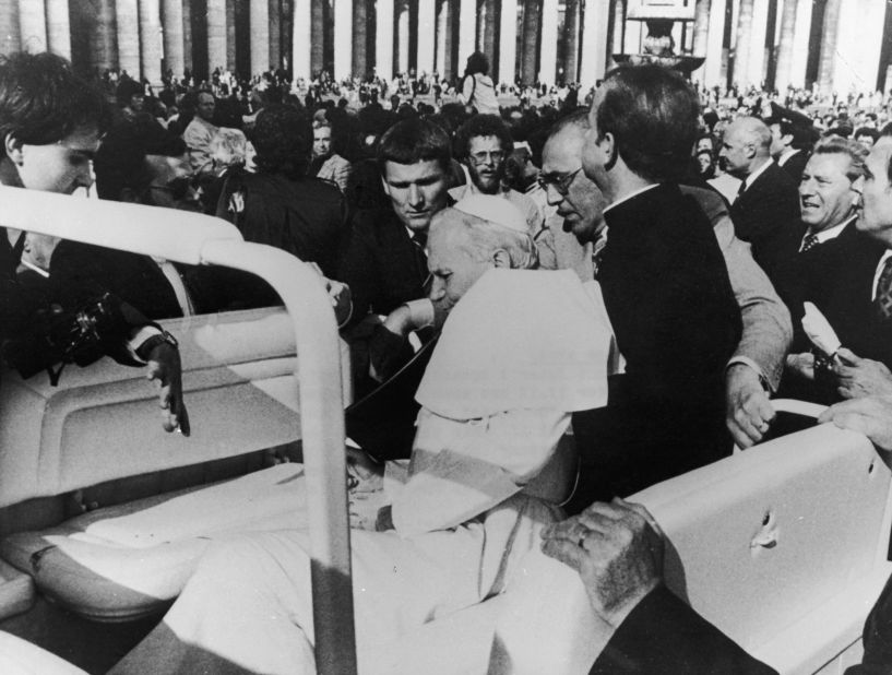 Pope John Paul II is shot by would-be assassin Mehmet Ali Agca in St. Peter's Square on May 13, 1981. Following the assassination attempt, the Popemobile was equipped with bullet-proof glass.
