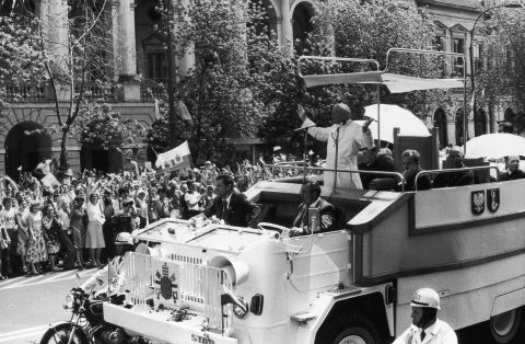 1980: Pope John Paul II waves to the crowds from his custom-built truck during a visit to his homeland Poland. 