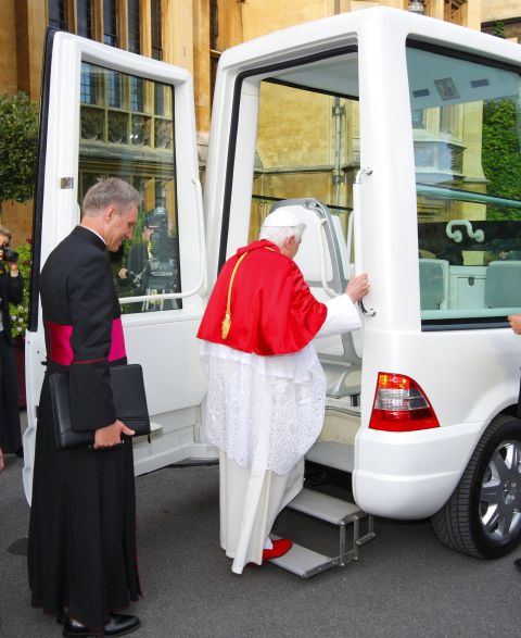 This picture shows the way the pope enters a Popemobile. The back door is opened, revealing a small staircase to help him board smoothly.(September 17, 2010 in London, England)