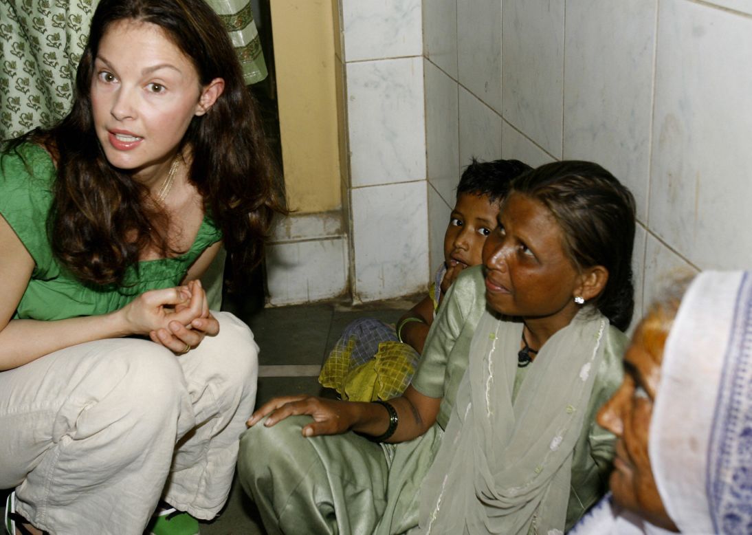 Actress Ashley Judd, a global ambassador for YouthAIDS, actively campaigns for awareness of international poverty. In 2010, Judd traveled to the Democratic Republic of Congo to raise awareness of how sexual violence is driven by conflict minerals in Congo. Here, Judd speaks in Mumbai, India, while raising awareness about AIDS in March 2007.