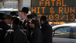 Members of the Brooklyn Orthodox Jewish community attend a news conference Monday, March 4, after an Orthodox couple died in a hit-and run-crash on Sunday. The day after the crash killed them, it claimed another life: their newborn son.