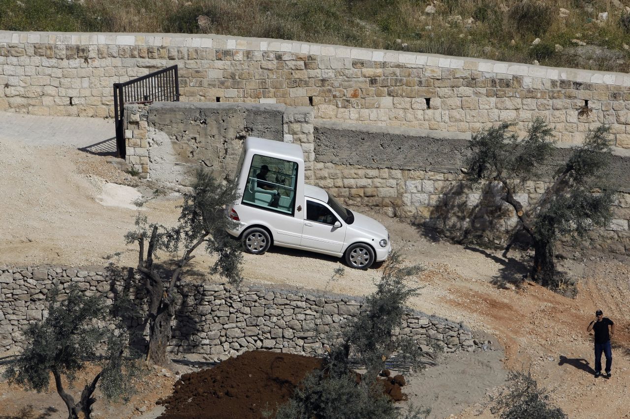 An Israeli worker drives the Popemobile during a rehearsal on May 6, 2009 at the foot of the Mount of Olives in Jerusalem. Israel's internal security agency was originally opposed to the pontiff using his Popemobile while in Nazareth on a tour of the Holy Land, according to a government document presented to the weekly Cabinet meeting on April 26.