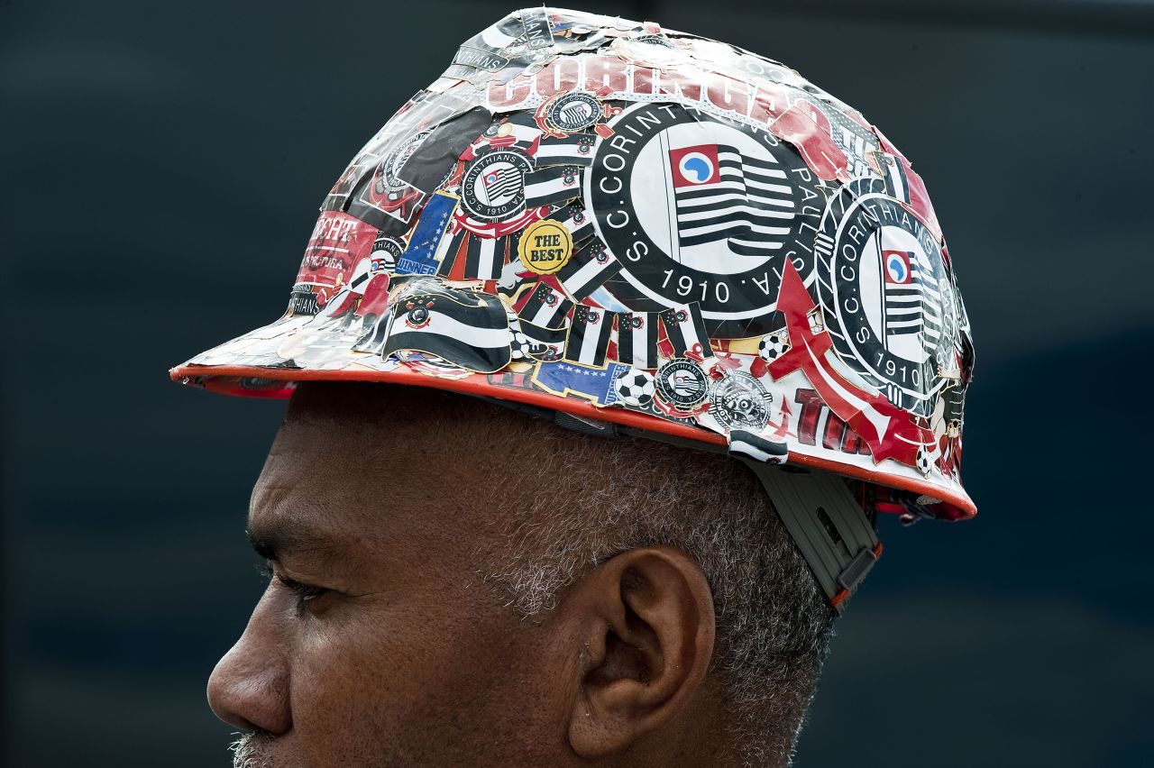 A construction worker at the site of the Itaquerao football stadium which will host the opening football matches of the FIFA World Cup 2014 in Sao Paulo, Brazil.