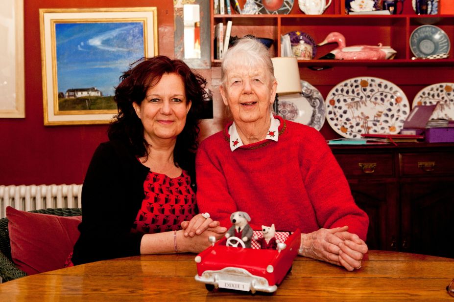 Like mother, like daughter. Shirley Hughes and her daughter Clara Vulliamy together after working on their first collaboration, "Dixie O'Day". A model of Dixie and his sidekick Percy is in front of them on the table.
