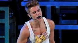 Justin Bieber performs live on stage at O2 Arena on March 4, 2013 in London,