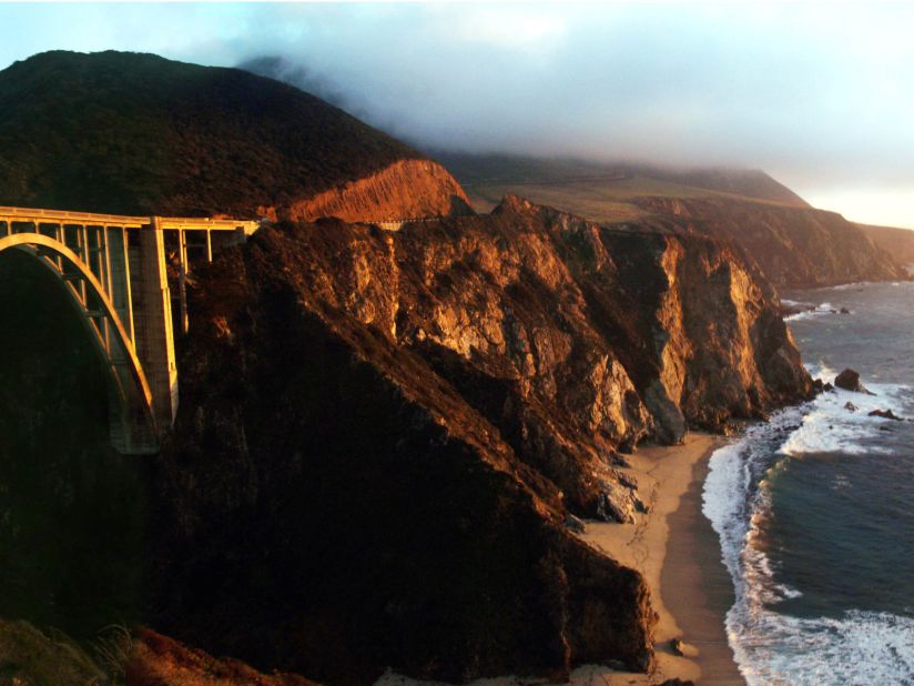 The drive crossing through Big Sur requires a strong stomach, but the rewards are worth it. Visitors can stop at Sea Lion Point Trail, the Whalers Cabin Museum and the redwood trees at Julia Pfeiffer Burns State Park. The Bixby Creek Bridge shown here is one of the world's highest single-span bridges (at 260 feet). 