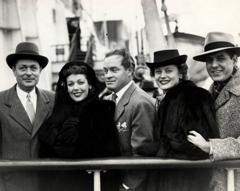 Screen star Bob Hope (center) was one of many celebrities who stayed on board the Queen Mary, jumping aboard for her final passenger voyage before World War II.  