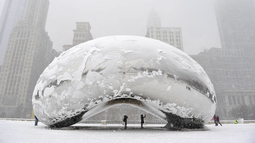 CHICAGO, IL - MARCH 5: The sculpture 'Cloud Gate', commonly known as 'the bean,' is covered in snow on March 5, 2013 in Chicago, Illinois. The worst winter storm of the season is expected to dump 7-10 inches of snow on the Chicago area with the worst expected for the evening commute. (Photo by Brian Kersey/Getty Images)