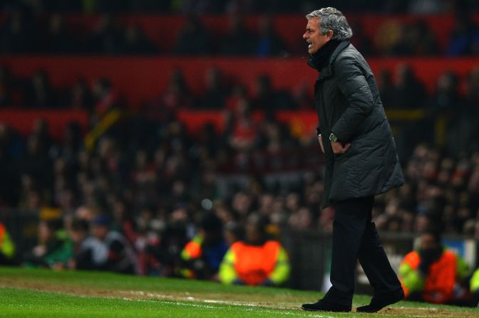 An agitated Jose Mourinho urges his team on during the first half at Old Trafford.